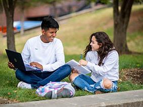 Two students studying on campus